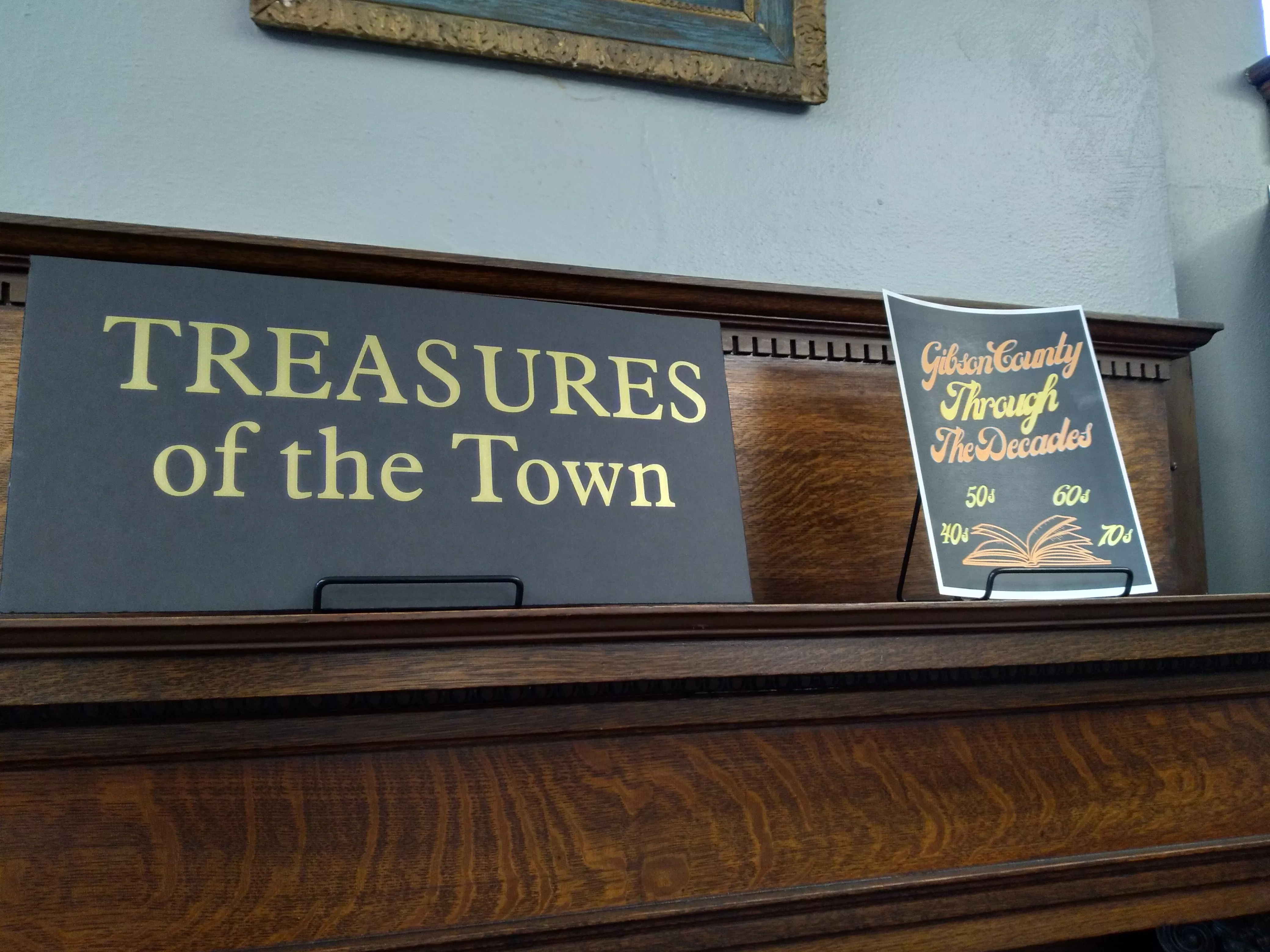 sign reading Treasures of the Town